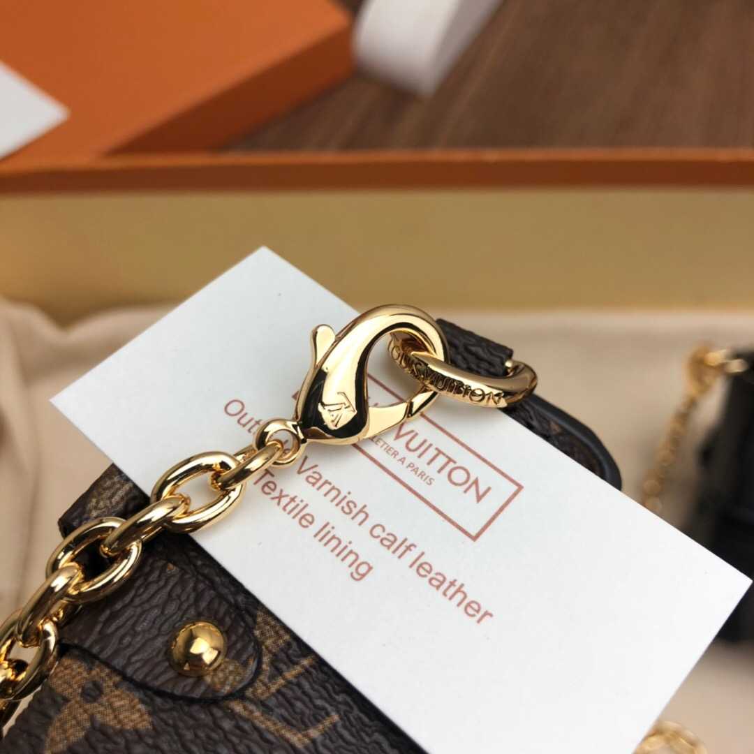LV M68575 ESSENTIAL TRUNK 黄花链条包